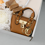 Cozy Coffee & Treats Gift Box – Ground Coffee, Notebook & Pen, Rose Candle, Mini Bag Keychain, Sugar-Free Caramel Candles Key