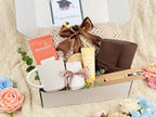 Graduation Gift Box for Him or Her – Luxury Congratulations Gift Basket with Knitted Throw Blanket, Leather Journal, Ceramic Mug, and Gourmet Cocoa Set