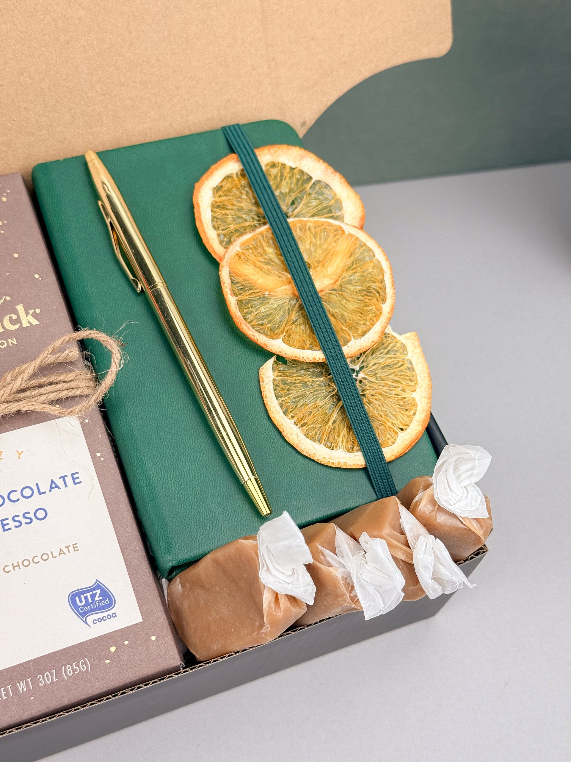 Cozy Coffee & Chocolate Gift Box – Ground Coffee, Notebook & Gold Pen, Dark Chocolate Espresso Bar, Sugar-Free Caramel Candles, Dried Orange Slices Left