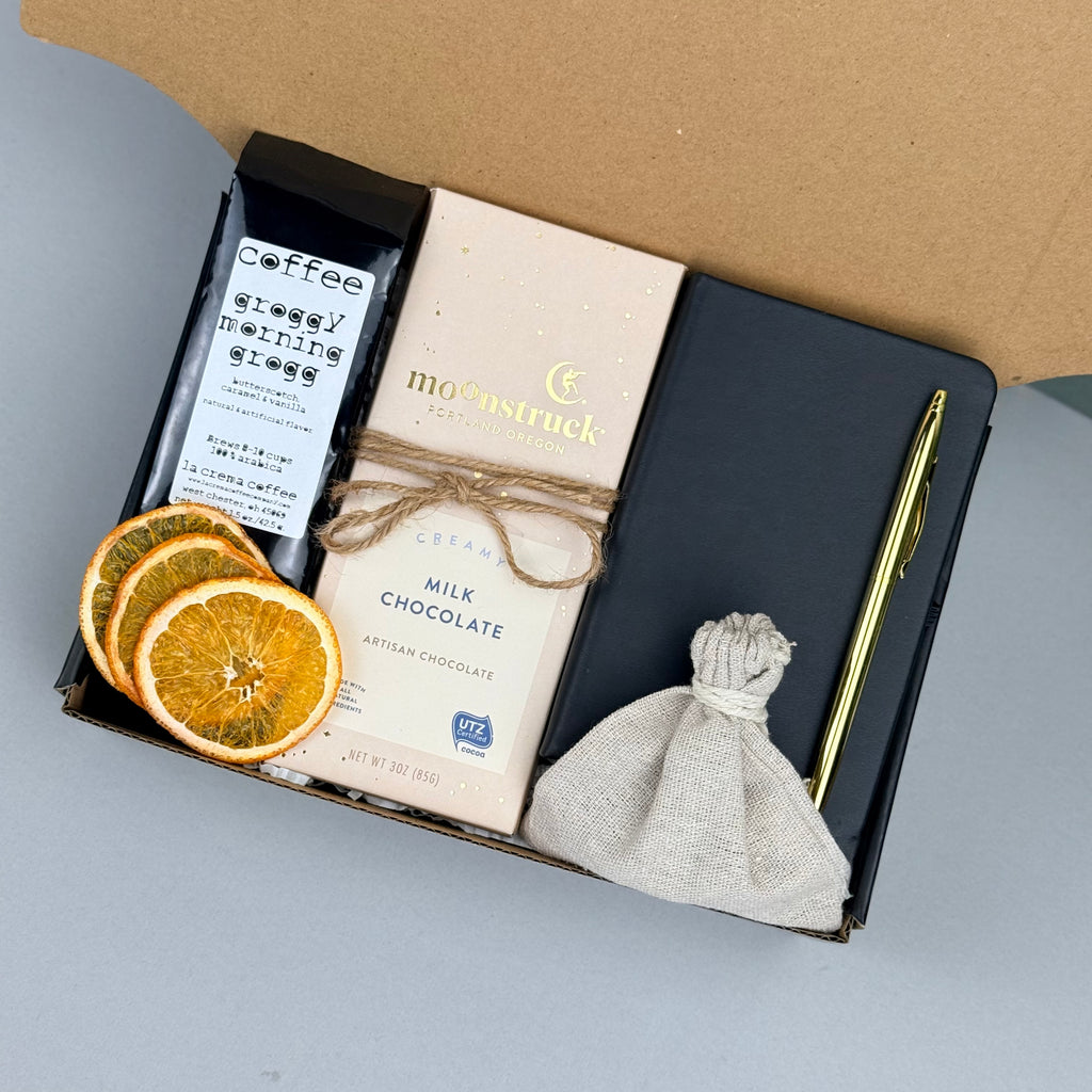 Cozy Coffee Gift Box with Ground Coffee, Notebook with Gold Pen, Milk Chocolate Espresso Bar, Caramel Candles, Dried Orange Slices Top