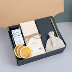 Cozy Coffee Gift Box with Ground Coffee, Notebook with Gold Pen, Milk Chocolate Espresso Bar, Caramel Candles, Dried Orange Slices